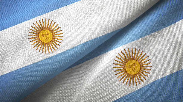 istock Argentina two flags together realations textile cloth fabric texture 1092803124