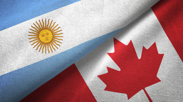 istock Canada and Argentina two flags together realations textile cloth fabric texture 1092803650