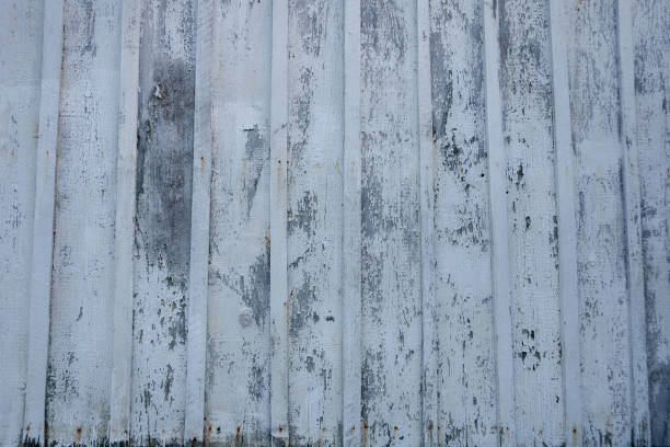istock Background of Old, Weathered, Vertical Building Siding 1092806718