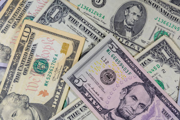 istock Background of different american dollar banknotes 1092814232