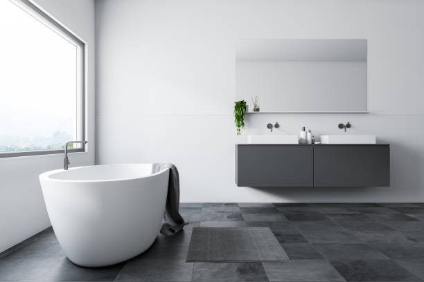 istock White bathroom, tub and sink, side view 1092818084