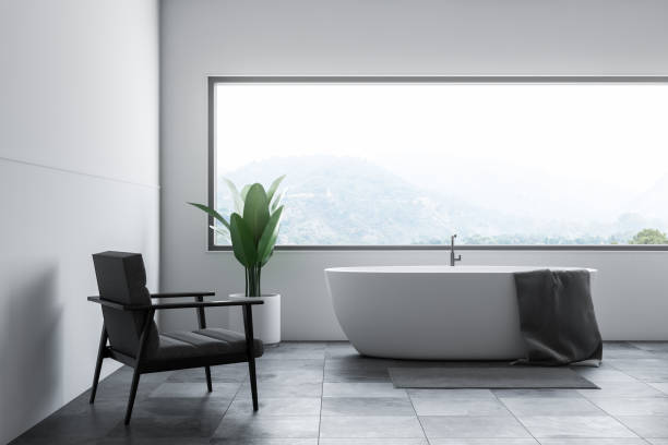 istock White bathroom tub and armchair 1092819254