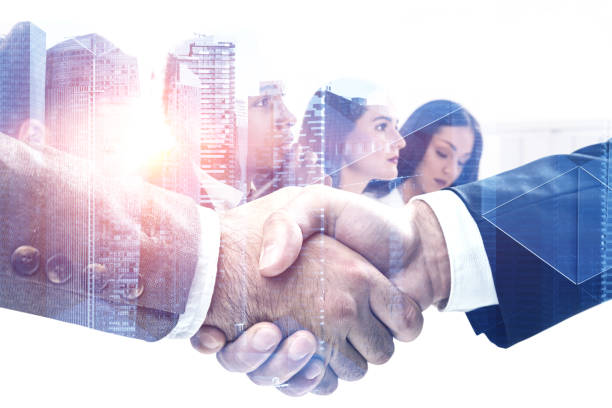 istock Handshake in city, business team 1092820572