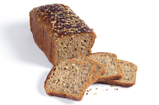 istock Loaf and pieces of bread with different seeds 1092832174