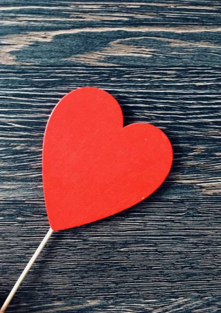 istock Red heart, wooden background 1092840068