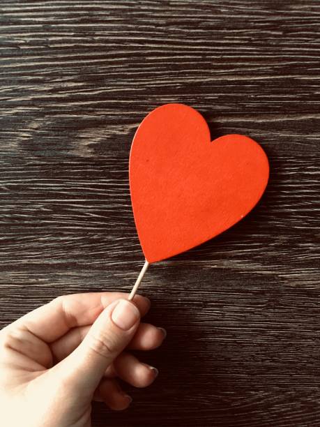istock Red heart, wooden background 1092840172