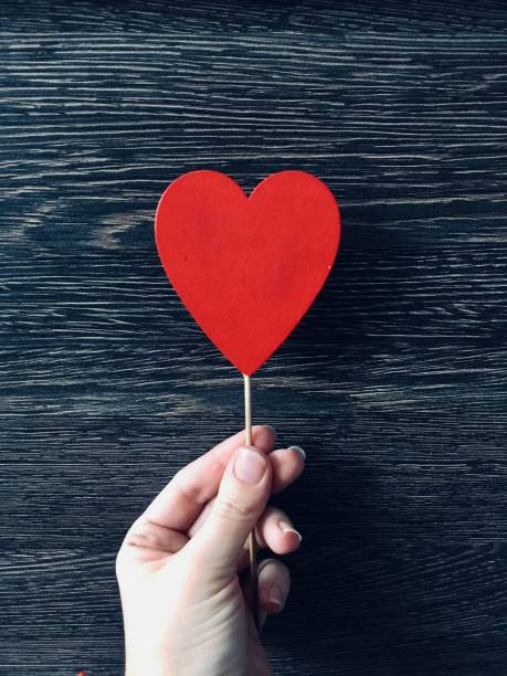istock Red heart, wooden background 1092840180