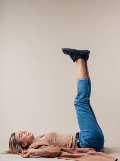 istock Casual girl lying down on the floor 1092840588