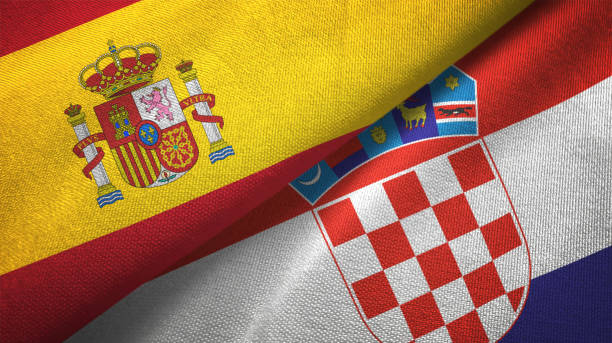 istock Croatia and Spain two flags together realations textile cloth fabric texture 1092844084