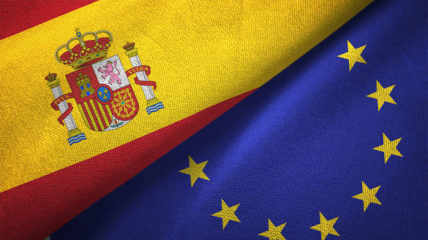 europäischen union und spanien zwei fahnen zusammen realations textil tuch stoff textur - european community government flag sign stock-fotos und bilder