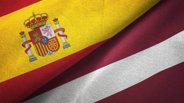 istock Latvia and Spain two flags together realations textile cloth fabric texture 1092844640