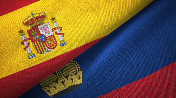 istock Liechtenstein and Spain two flags together realations textile cloth fabric texture 1092845006