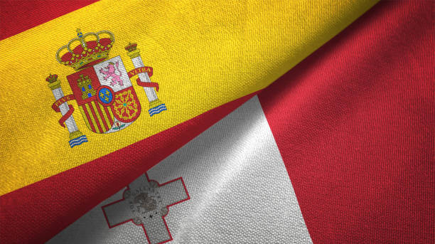 istock Malta and Spain two flags together realations textile cloth fabric texture 1092845038