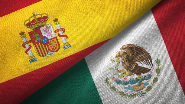 istock Mexico and Spain two flags together realations textile cloth fabric texture 1092845092