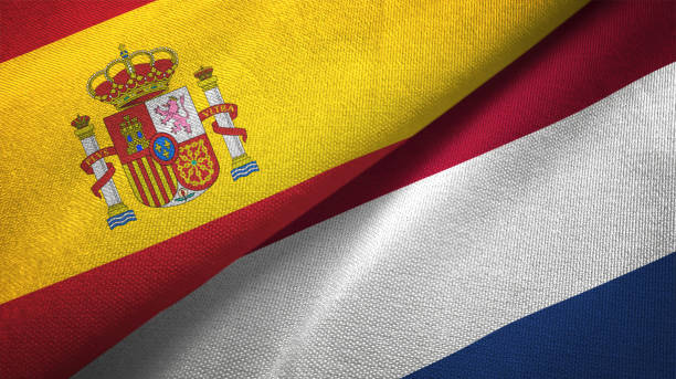 istock Netherlands and Spain two flags together realations textile cloth fabric texture 1092845178