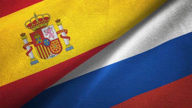 istock Russia and Spain two flags together realations textile cloth fabric texture 1092845366