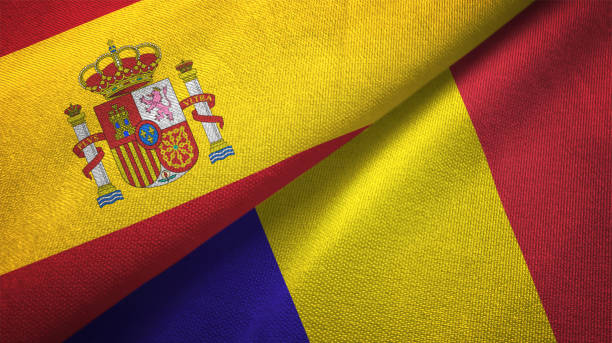 istock Romania and Spain two flags together realations textile cloth fabric texture 1092845374