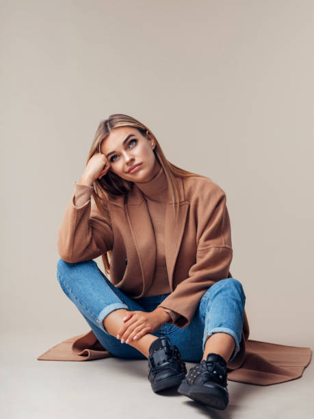 istock Woman is sitting on the floor 1092845584