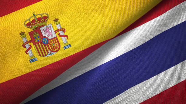 istock Thailand and Spain two flags together realations textile cloth fabric texture 1092846600