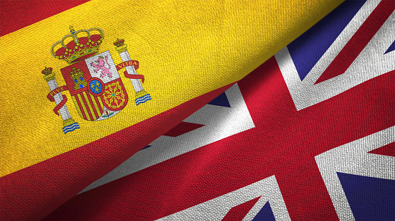 United Kingdom and Spain flag together realtions textile cloth fabric texture