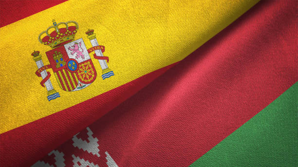 istock Belarus and Spain two flags together realations textile cloth fabric texture 1092847222