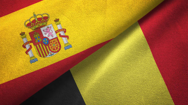 istock Belgium and Spain two flags together realations textile cloth fabric texture 1092847256