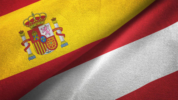 istock Austria and Spain two flags together realations textile cloth fabric texture 1092847350
