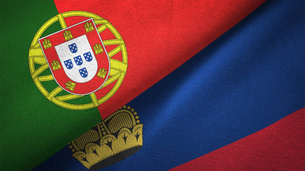 istock Liechtenstein and Portugal two flags together realations textile cloth fabric texture 1092851518