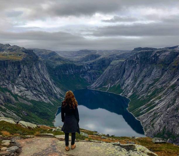 istock Girl looking at Fjord 1092852276