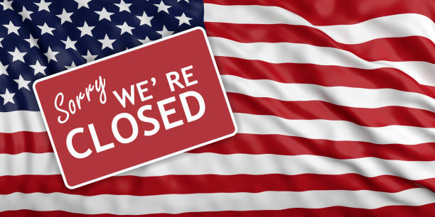 istock Government shutdown. Sorry we re closed on US flag background. 3d illustration 1092854604