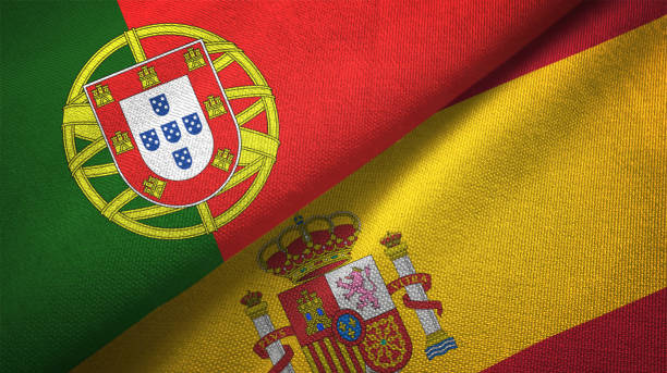 istock Spain and Portugal two flags together realations textile cloth fabric texture 1092854624