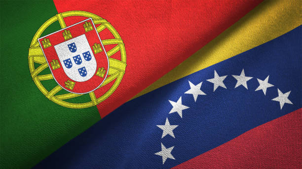 istock Venezuela and Portugal two flags together realations textile cloth fabric texture 1092855664
