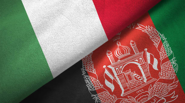istock Afghanistan and Italy two flags together textile cloth fabric texture 1092858610