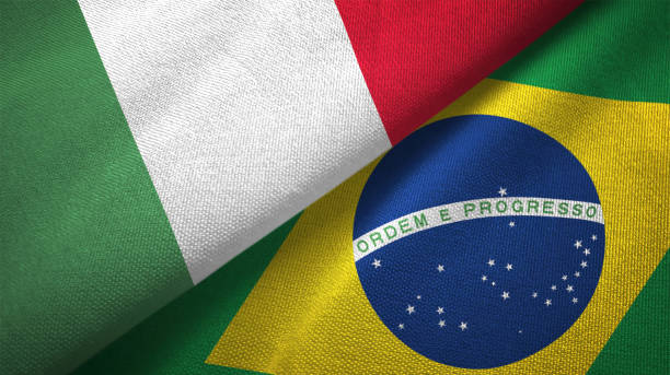 istock Brazil and Italy two flags together textile cloth fabric texture 1092858828