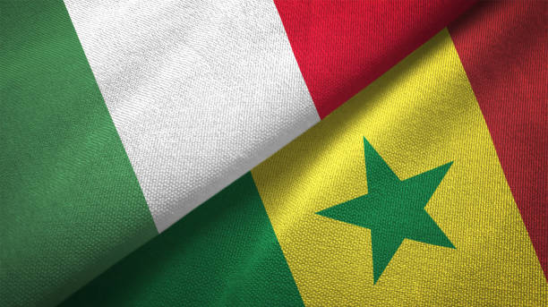 istock Senegal and Italy two flags together textile cloth fabric texture 1092860612