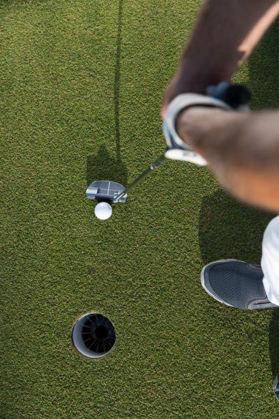 istock Golf, Golf player putting the golf ball near hole - links golf 1092862020