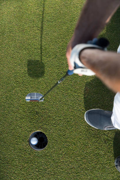 istock Golf, Golf player putting the golf ball near hole - links golf 1092862570
