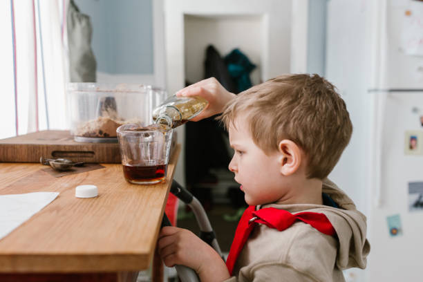 istock Child cooking and baking in kitchen at home 1092866664