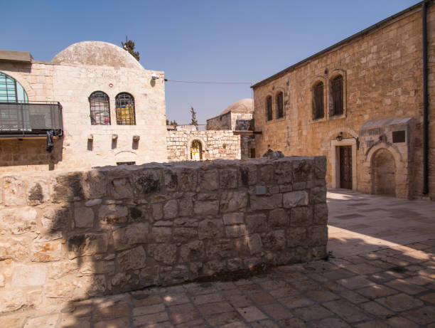 istock a cat on the wall in the old district of Jerusalem 1092866820