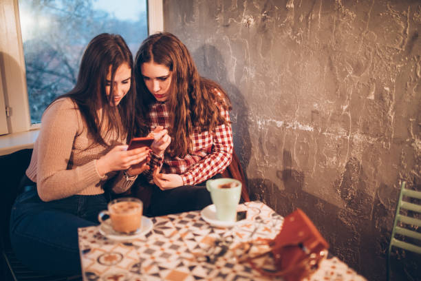 istock Two female friends on a coffee break downtown 1092870086