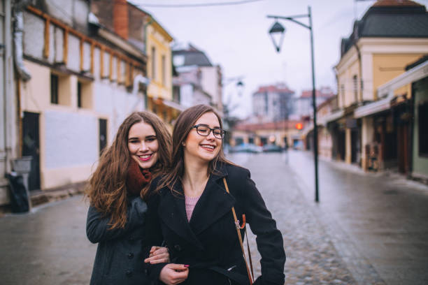 istock Two female friends going for a walk downtown 1092872282