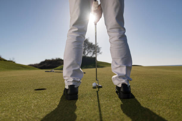 istock Golf, Golf player putting the golf ball near hole - links golf - Close up 1092873096