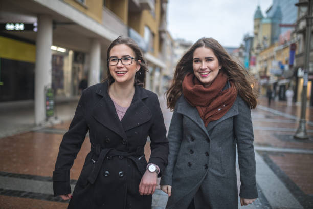 istock Two female friends going for a walk downtown 1092873686