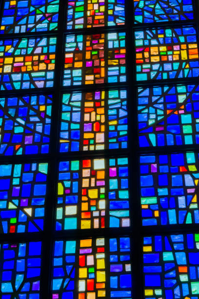 istock Glass Stained cross in a church 1092881810