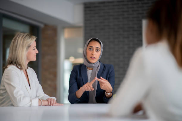 istock Muslim woman leading a discussion 1092882836
