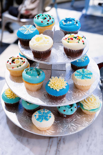 Blue and white cupcakes in plate