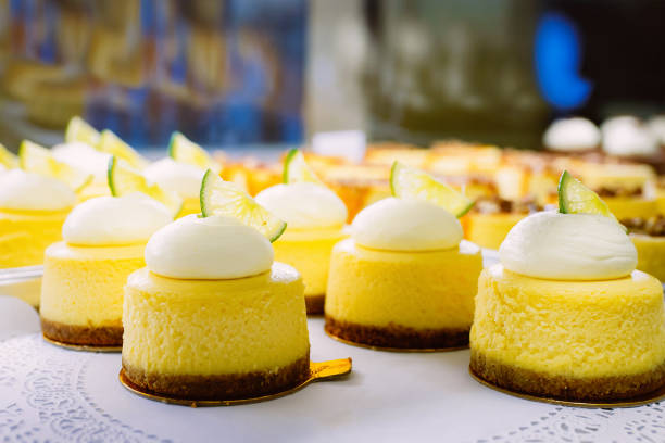 istock Vanilla Cheesecake pie desserts with cream and slice of lime 1092897032