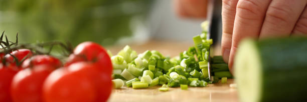 istock Cook holds knife in hand and cuts on 1092906736