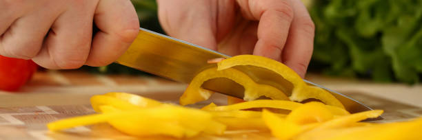 istock Cook holds knife in hand and cuts on 1092906778