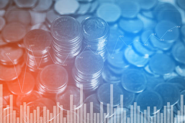 istock Double exposure of coin stack with financial graph over city and office building background, business and financial concept. 1092909644